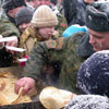 Soldiers were treating the guests with pancakes. [Press for large view]
