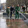 The community services spend the subbotnik scouring the fountains on Jakub Kolas Square [Press for large view]