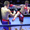 Andrey Kotsur (red shorts) and Dan Rallings (blue shorts), a dangerous blow [Press for large view]